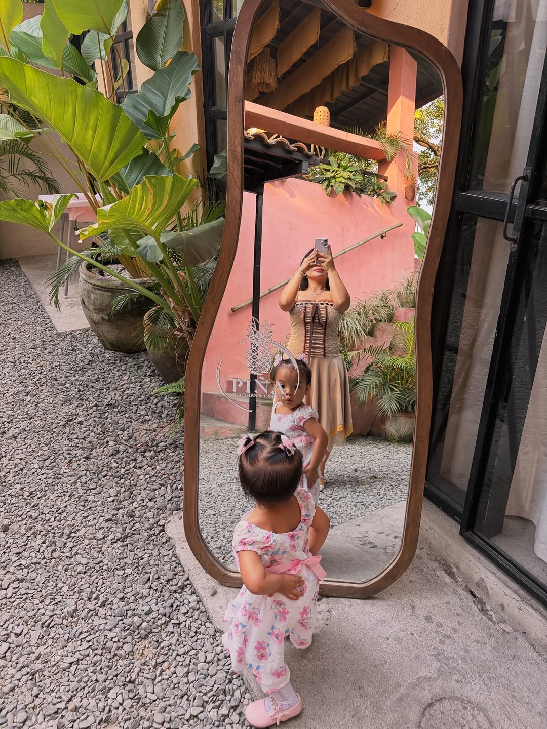 Mirror selfie at PIÑA entrance