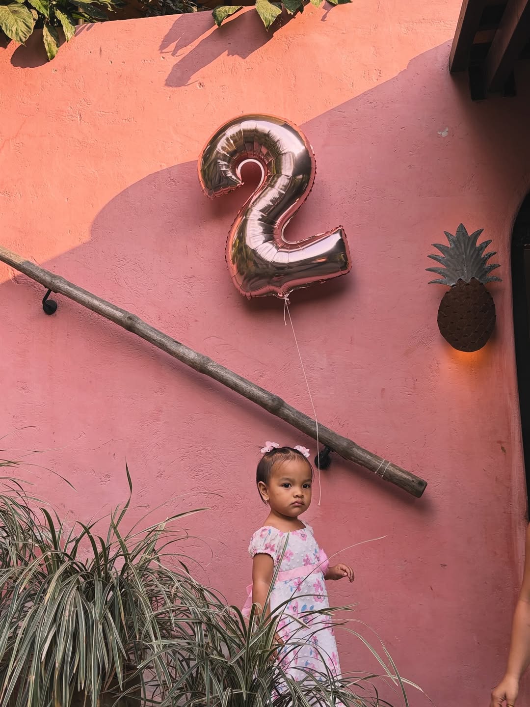 Birthday celebration at PIÑA — child with balloon