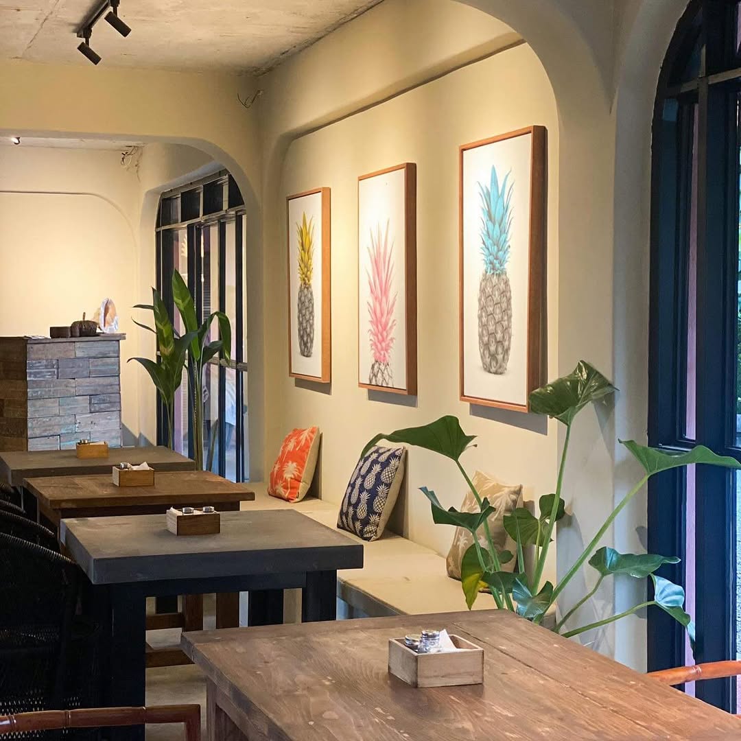 PIÑA's cozy interior with pineapple motif cushions